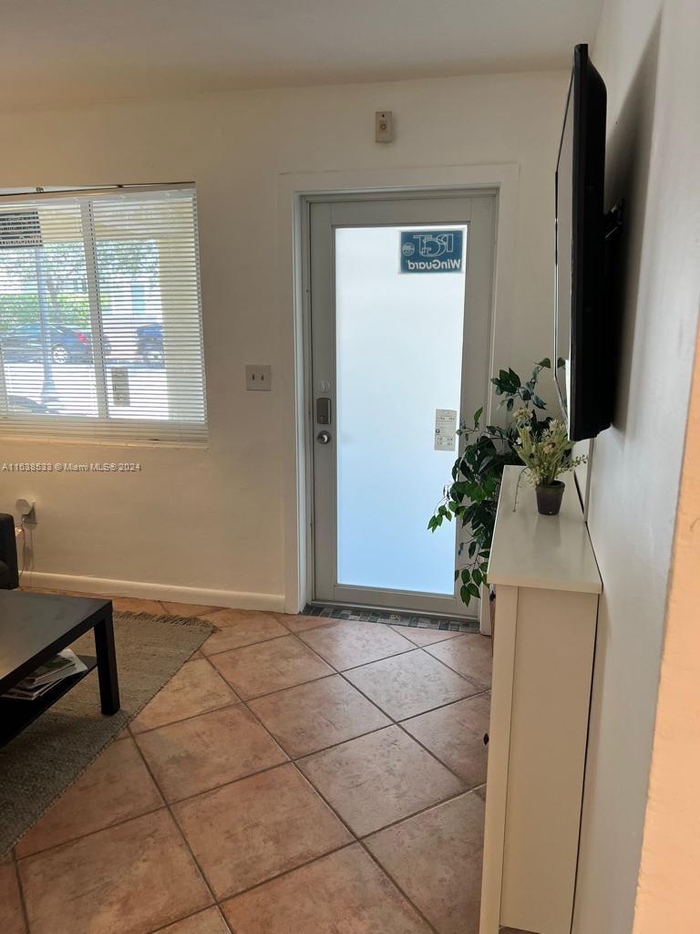 820 3rd Street, Unit 3 Miami Beach, FL 33139 - Photo 8 of 24 a view of a room with a potted plant