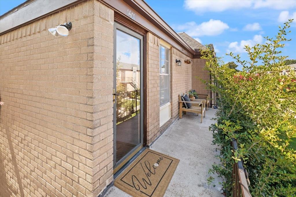 4100 Ridglea Country Club Drive, Unit 1401 Fort Worth, TX 76126 - Photo 25 of 27 a view of a backyard with sitting area