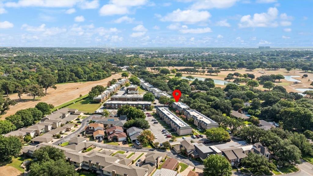 4100 Ridglea Country Club Drive, Unit 1401 Fort Worth, TX 76126 - Photo 27 of 27 an aerial view of residential houses with outdoor space