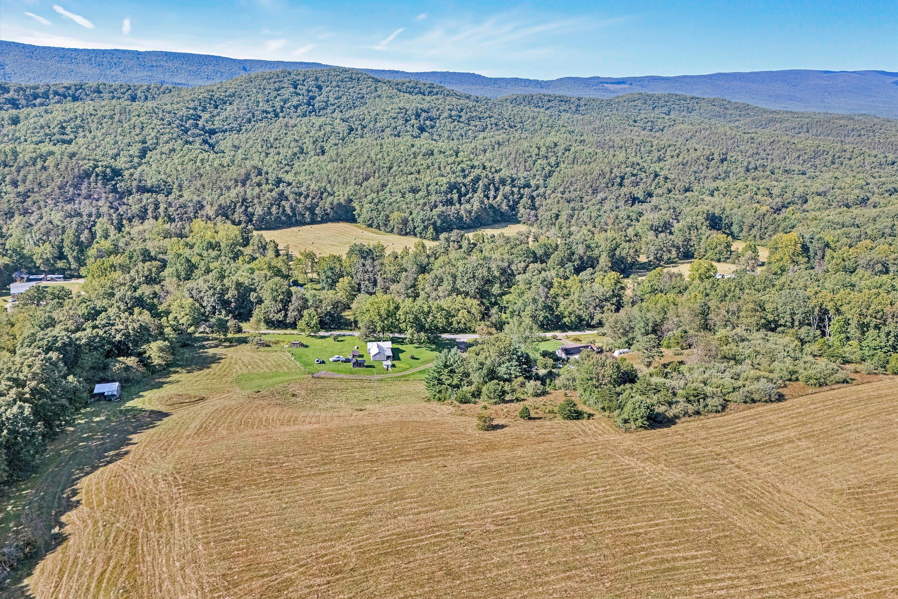 2816 Johns Creek Road New Castle, VA 24127 - Photo 3 of 40 a view of a yard with a mountain