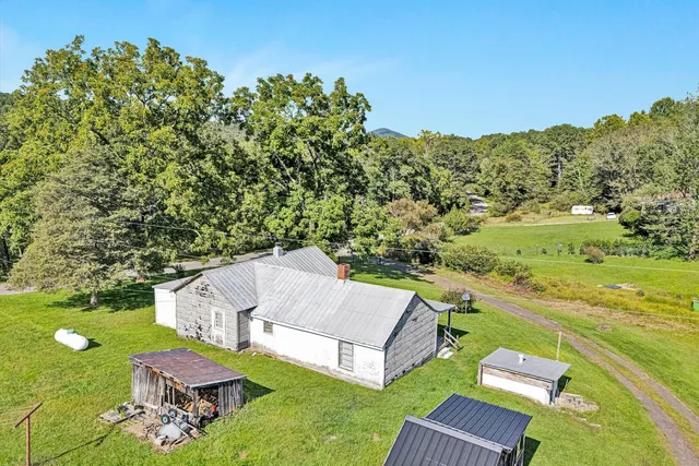 a view of a house with a ocean view