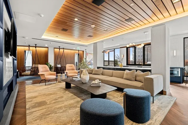 a view of a livingroom with furniture window and outside view