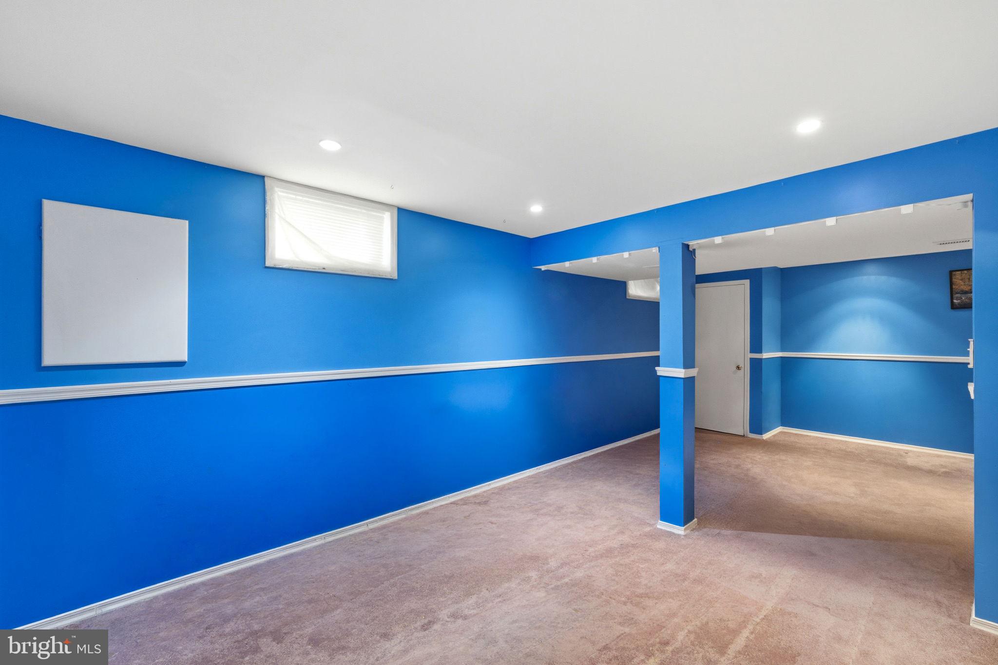 17 Paddock Road Marlton, NJ 08053 - Photo 39 of 54 Vibrant blue walls invite creativity.