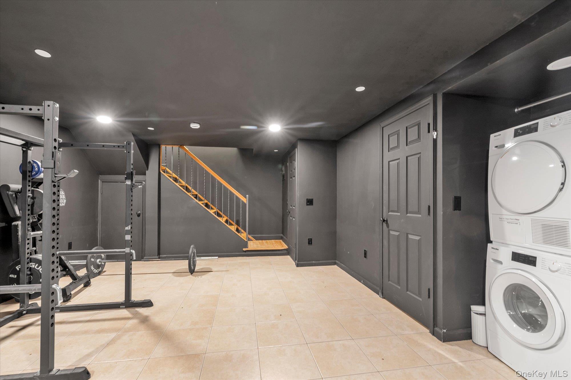 40-38 194th Street, Unit A1 Queens, NY 11358 - Photo 13 of 18 a view of a hallway with entryway washer and dryer