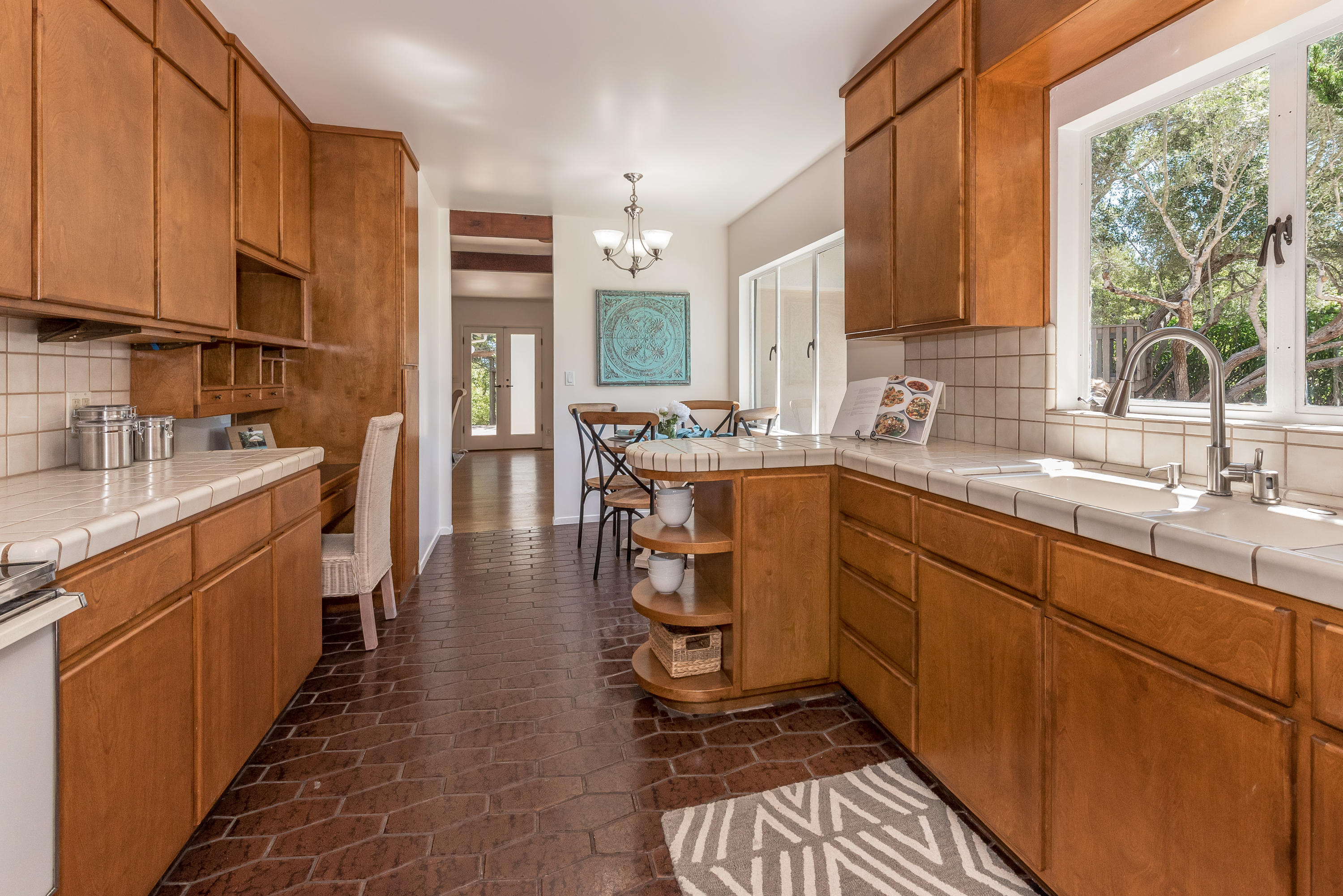 557 Scenic Drive Santa Barbara, CA 93103 - Photo 11 of 21 Kitchen with view to French Doors/Deck