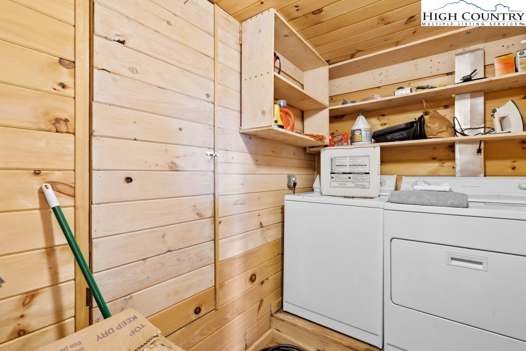 844 Pine Ridge Road Beech Mountain, NC 28604 - Photo 26 of 34 a utility room with dryer and washer
