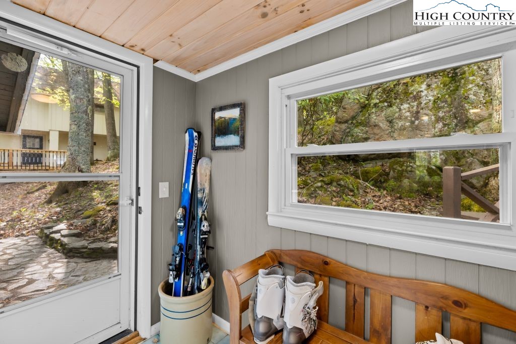 844 Pine Ridge Road Beech Mountain, NC 28604 - Photo 27 of 34 a front door view of a house with a porch