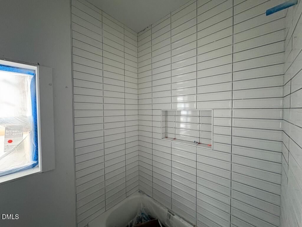 5013 Mitchell Town Road Youngsville, NC 27596 - Photo 12 of 15 a bathroom with a shower