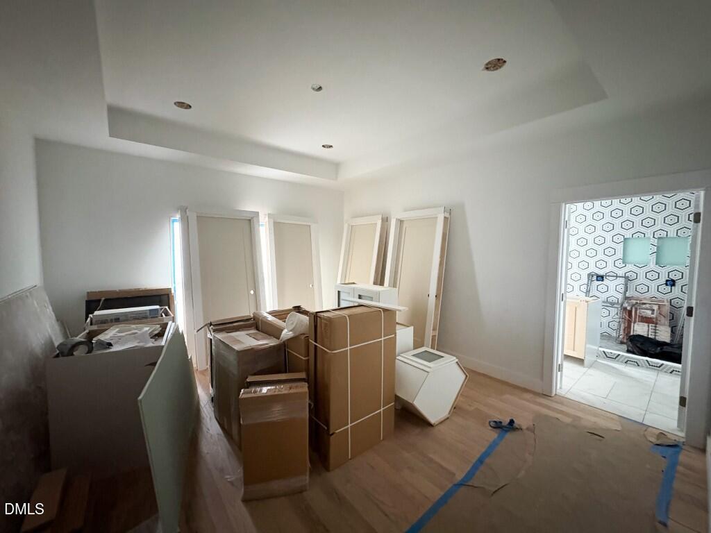 5013 Mitchell Town Road Youngsville, NC 27596 - Photo 6 of 15 a living room with furniture a flat screen tv and a window