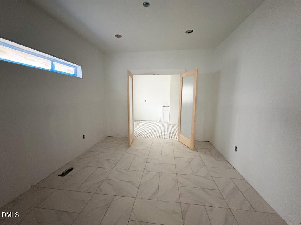 5013 Mitchell Town Road Youngsville, NC 27596 - Photo 9 of 15 a view of an empty room