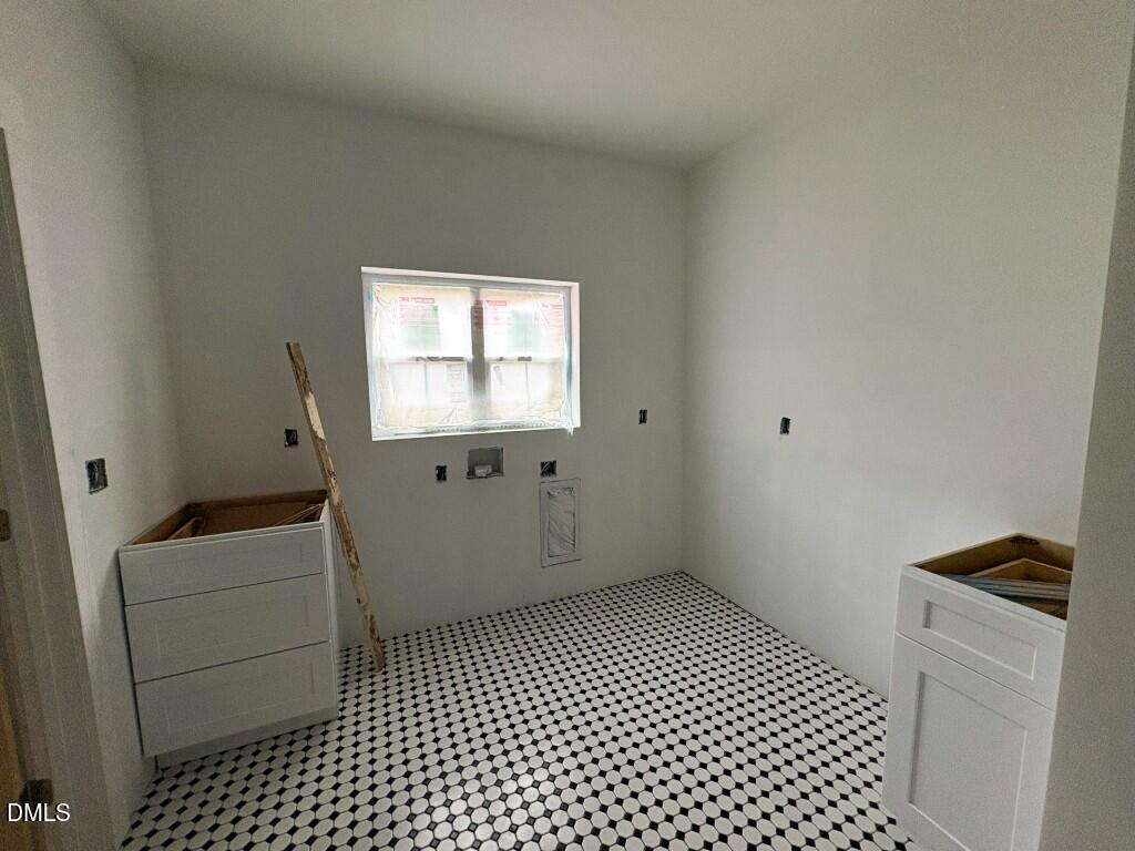 5013 Mitchell Town Road Youngsville, NC 27596 - Photo 10 of 15 a view of empty room with wooden floor
