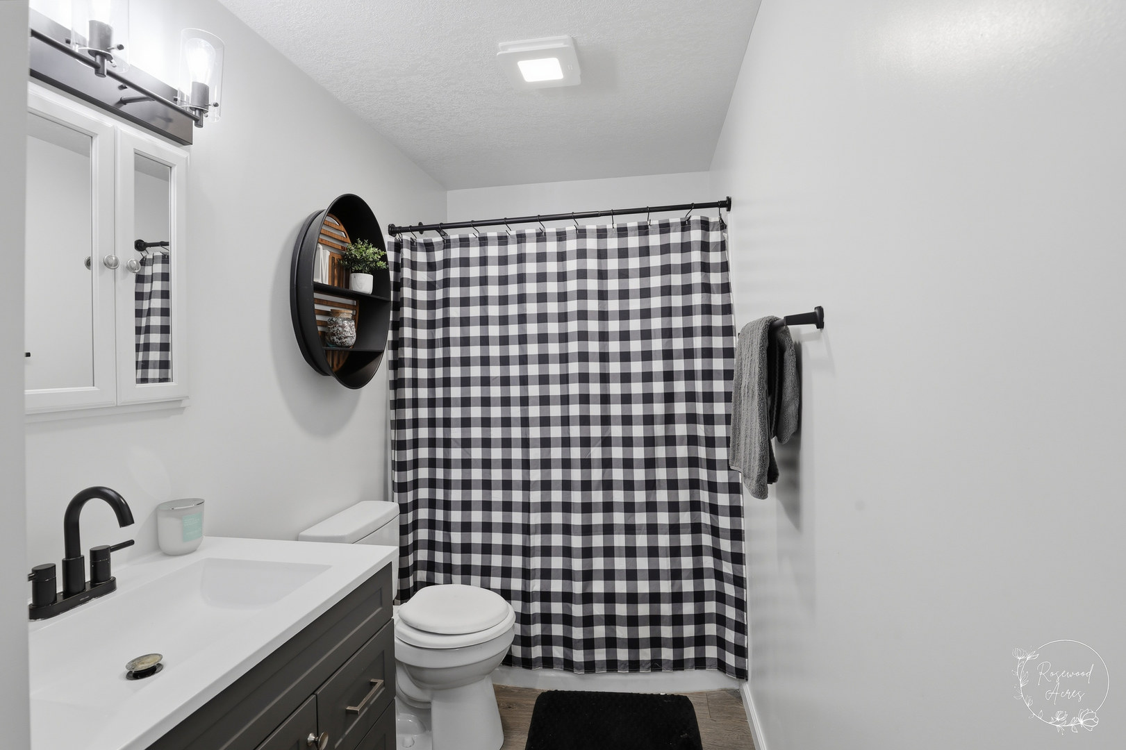 235 East 2740s Road Kankakee, IL 60901 - Photo 13 of 22 a bathroom with a sink toilet and a mirror