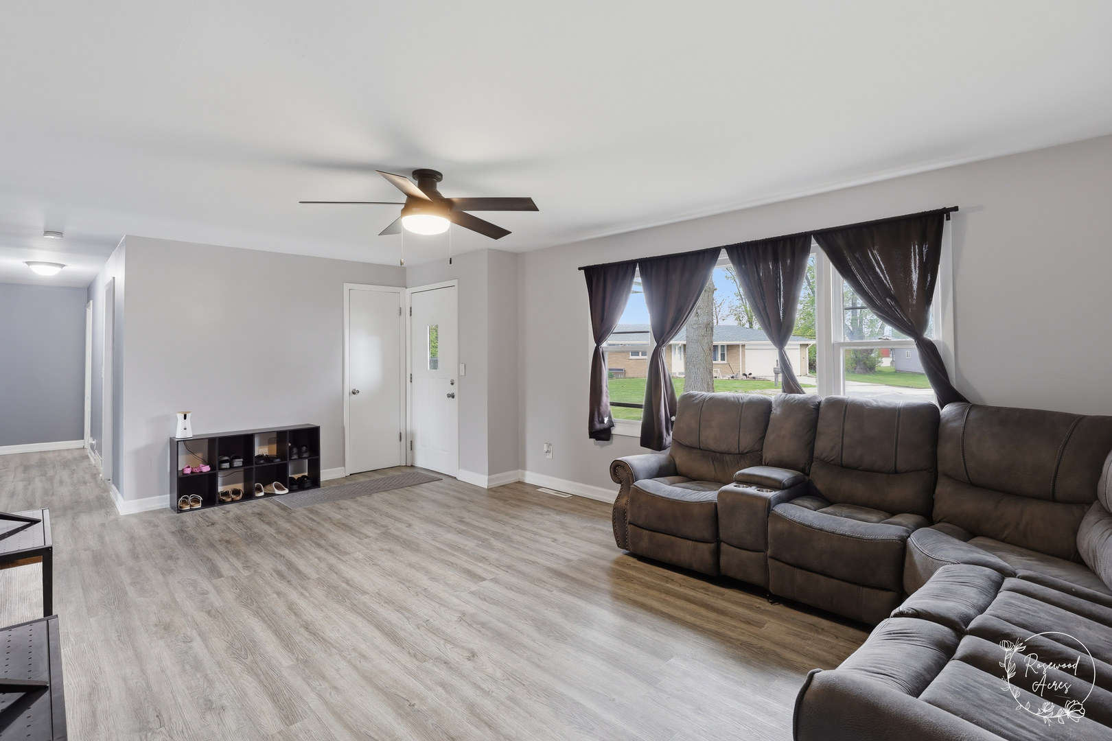 235 East 2740s Road Kankakee, IL 60901 - Photo 4 of 22 a living room with furniture and a fireplace