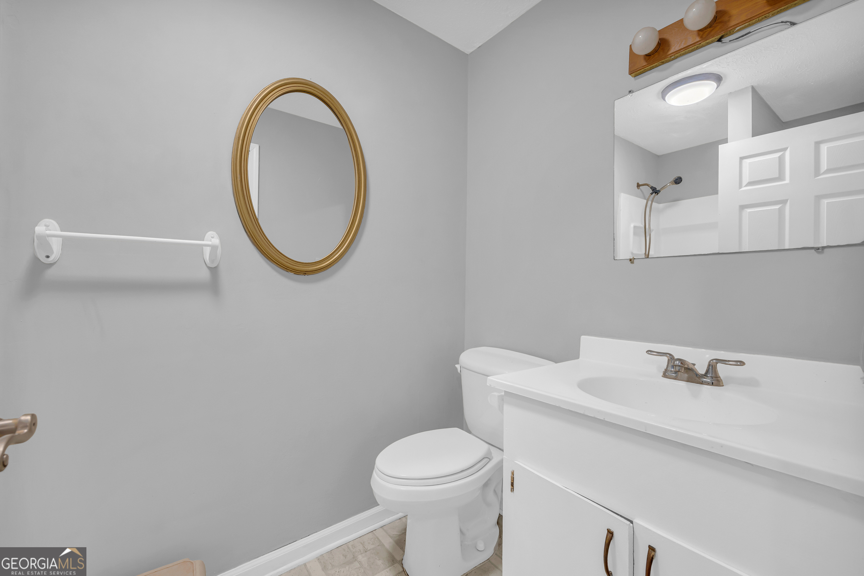 73 Highland Estates Commerce, GA 30529 - Photo 15 of 55 a bathroom with a sink and a toilet