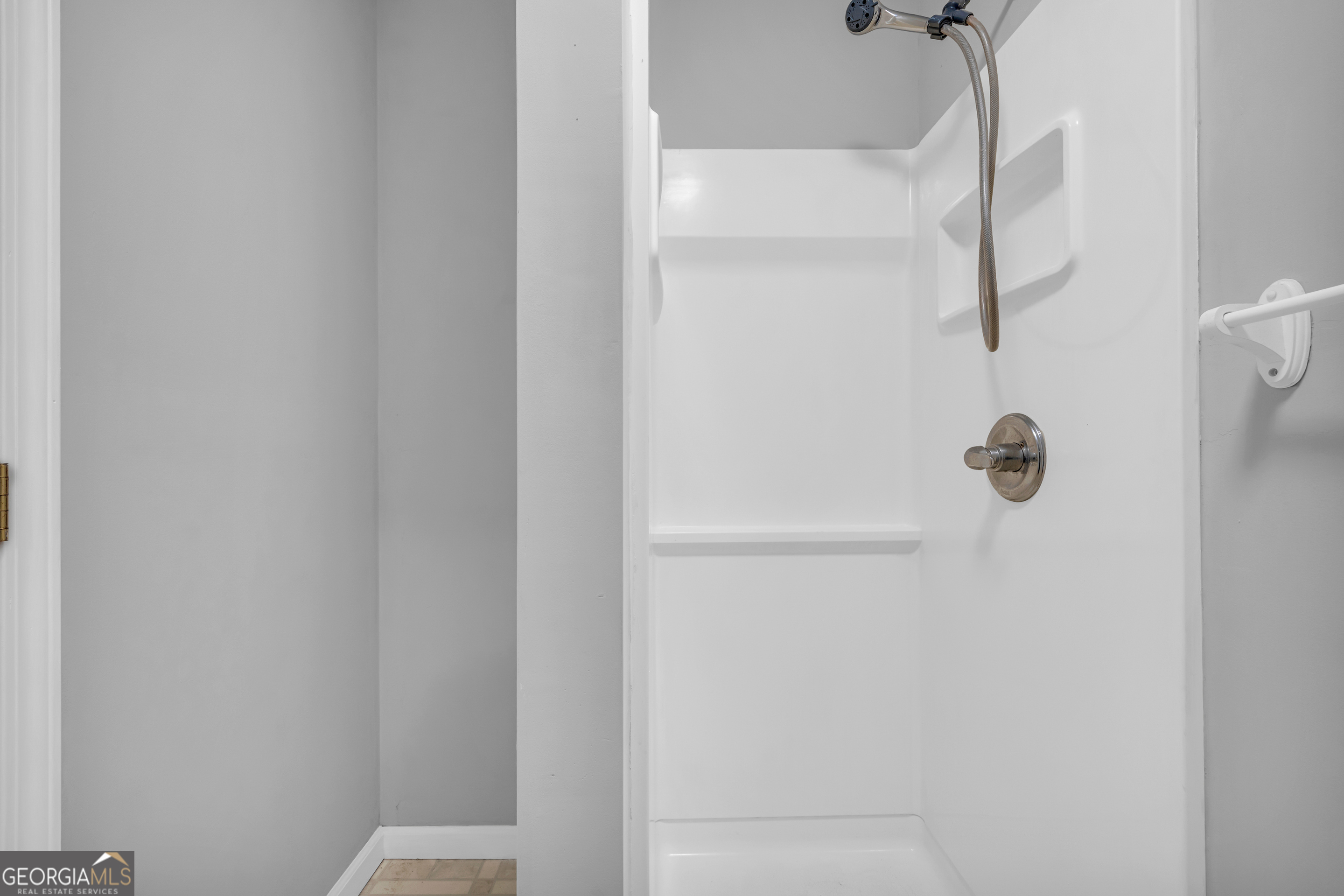 73 Highland Estates Commerce, GA 30529 - Photo 16 of 55 a close up of a shower