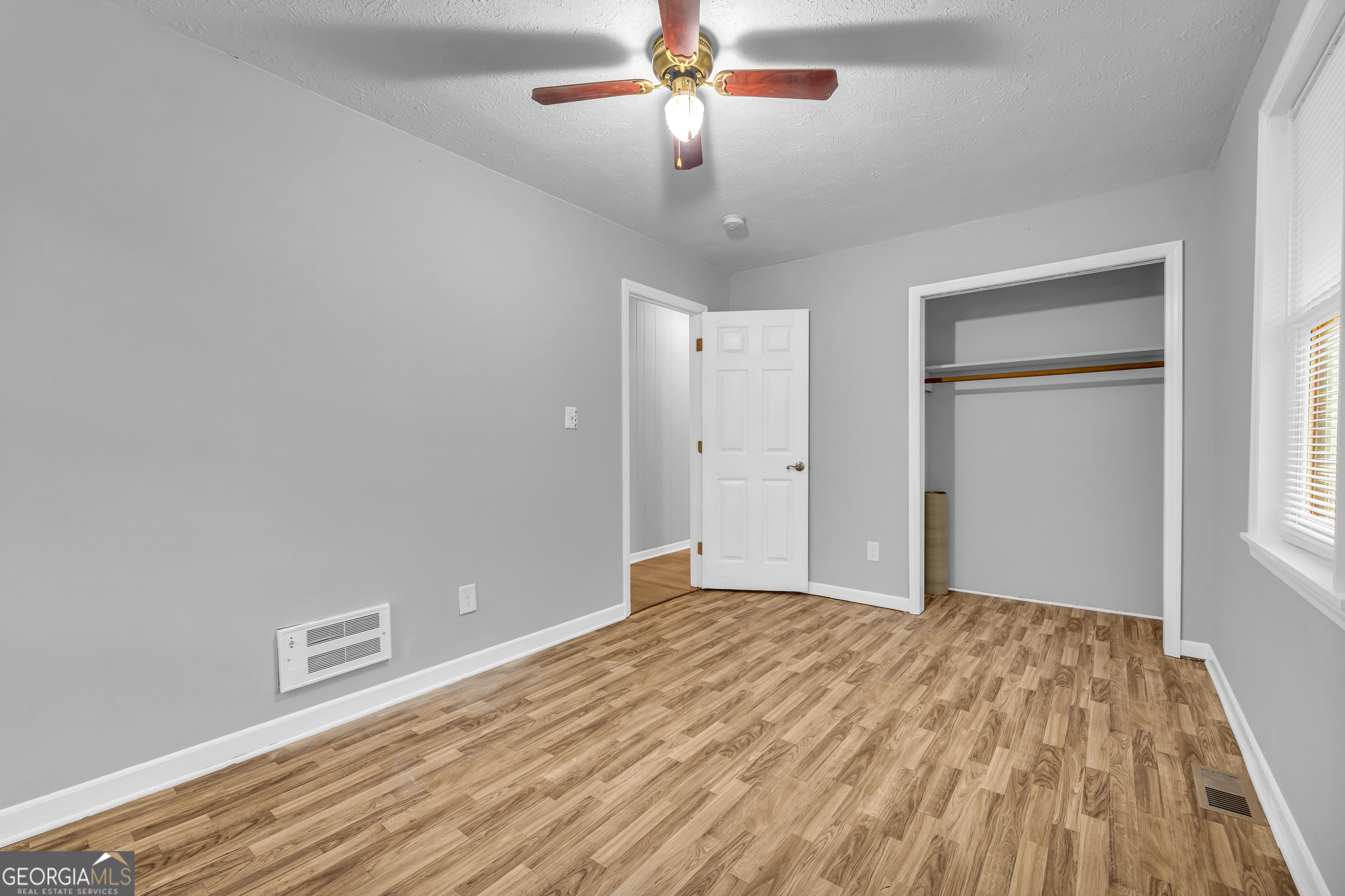 73 Highland Estates Commerce, GA 30529 - Photo 17 of 55 a view of empty room with wooden floor