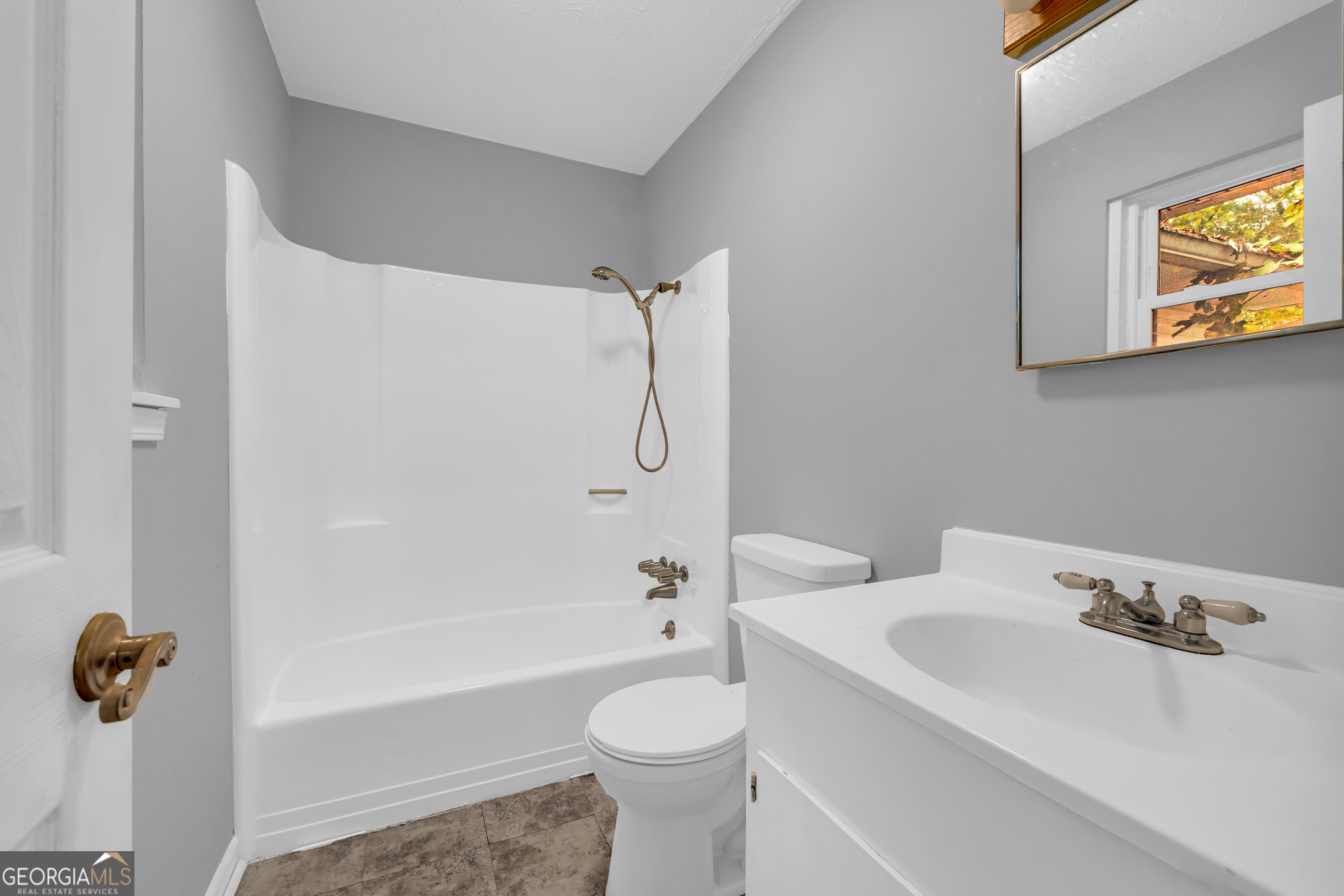 73 Highland Estates Commerce, GA 30529 - Photo 22 of 55 a bathroom with a sink a toilet and shower