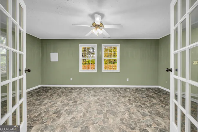 an empty room with windows