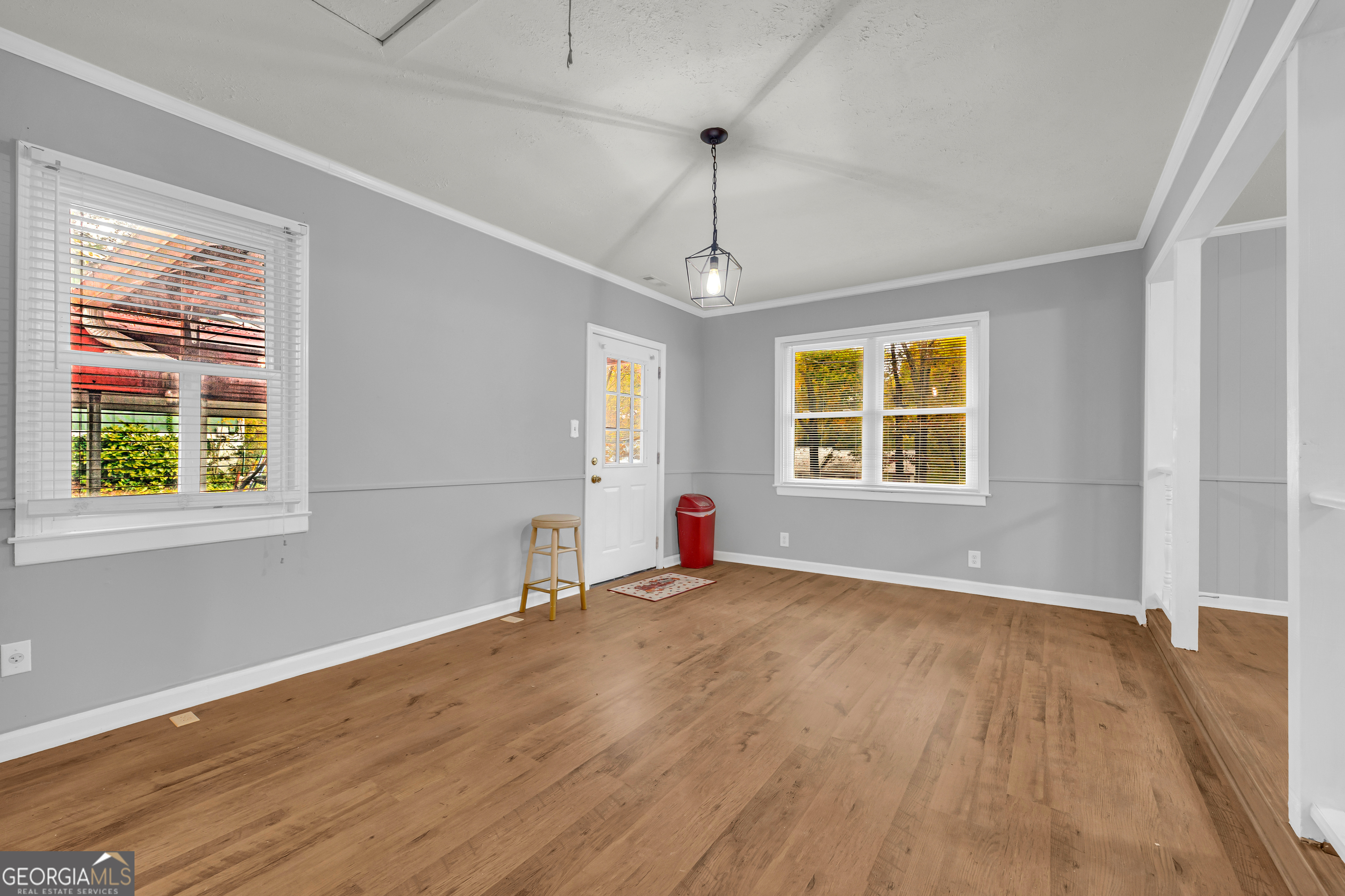 73 Highland Estates Commerce, GA 30529 - Photo 31 of 55 a view of an empty room with wooden floor and a window