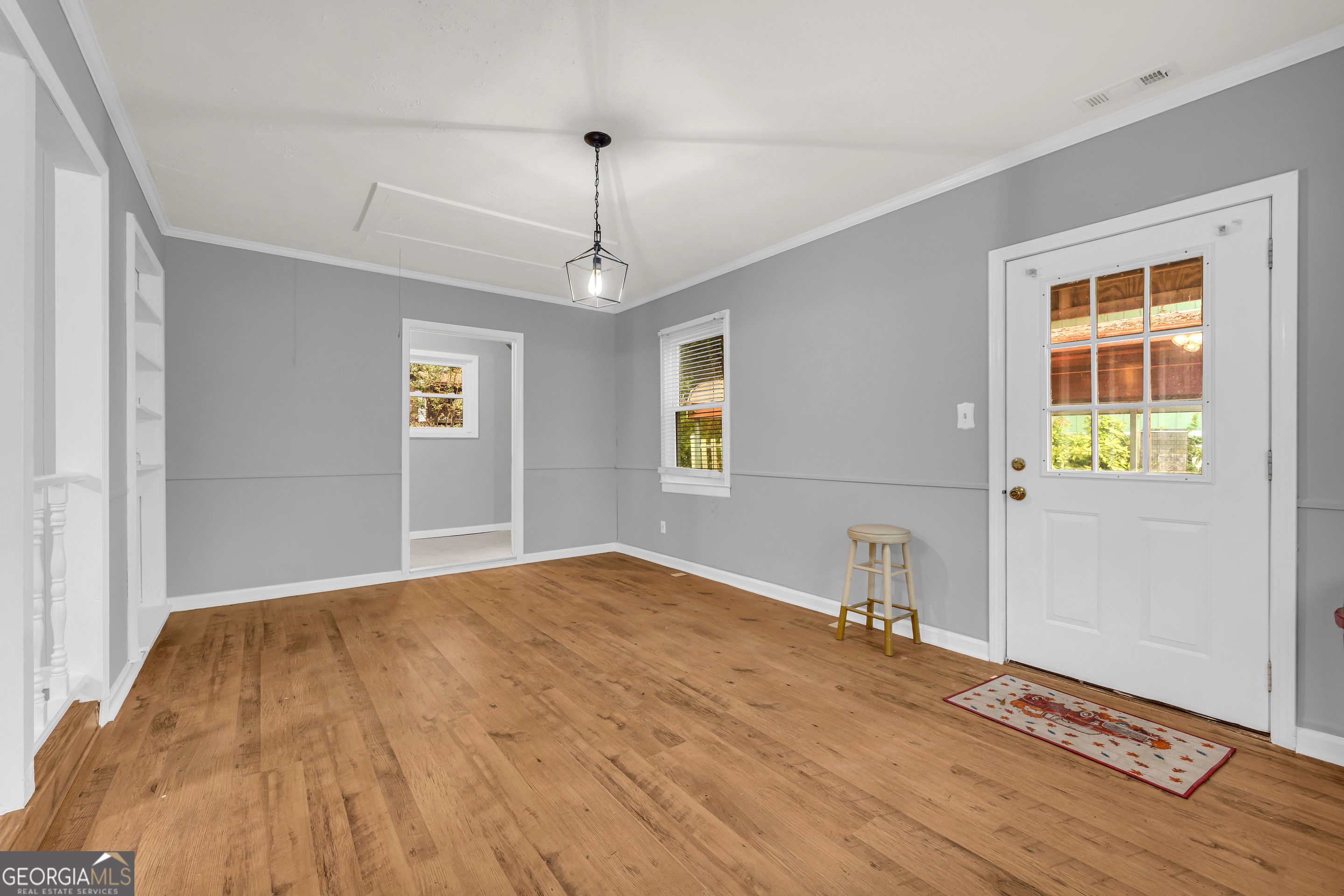 73 Highland Estates Commerce, GA 30529 - Photo 34 of 55 a view of empty room with wooden floor and fan