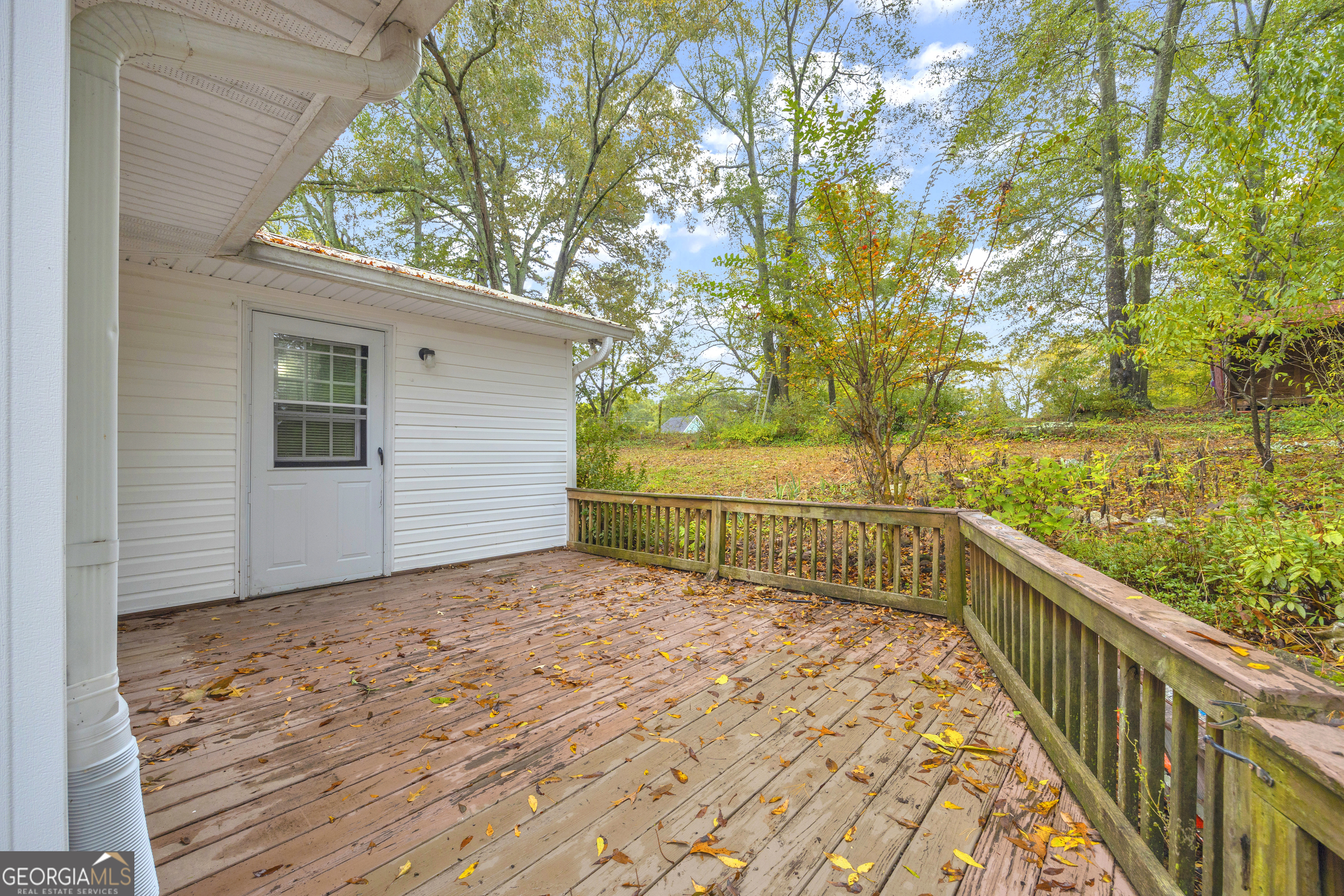 73 Highland Estates Commerce, GA 30529 - Photo 35 of 55 a view of a balcony with wooden floor