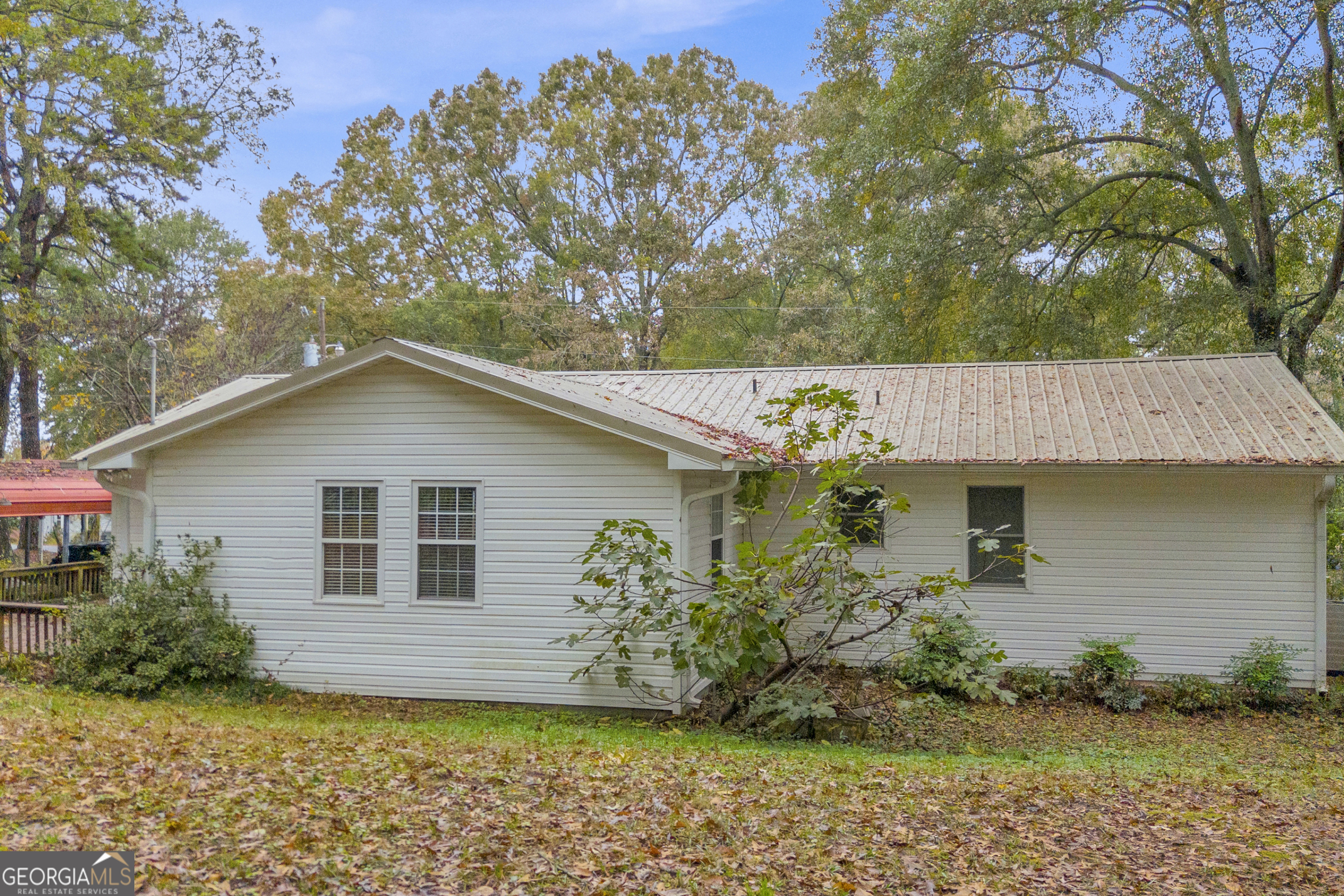 73 Highland Estates Commerce, GA 30529 - Photo 38 of 55 a house that has a tree in front of it