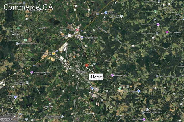 a view of a street with lots of trees