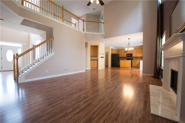 a view interior of a house an entryway and fire place