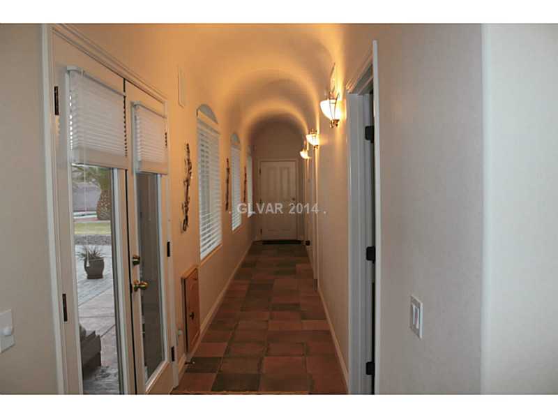 7745 Rancho Destino Road Las Vegas, NV 89123 - Photo 12 of 29 Property Photo. hallway to office, 2nd bdrm and laundry room