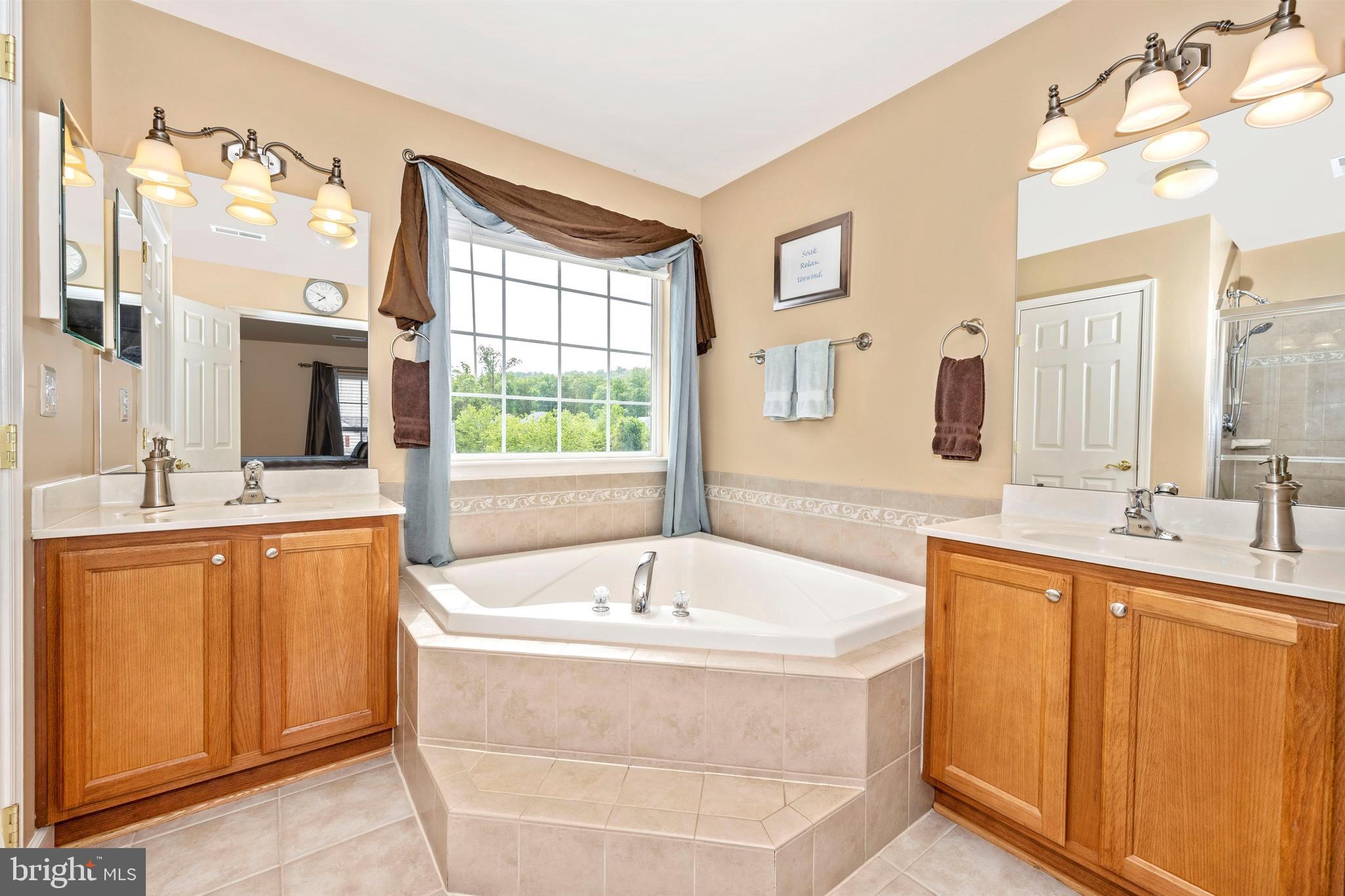 1748 Canal Run Drive Point of Rocks, MD 21777 - Photo 22 of 44 Master bathroom with dual vanities.