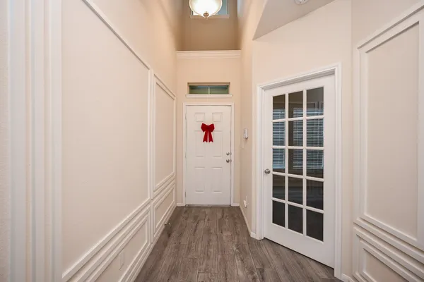 a view of wooden floor in front of a house