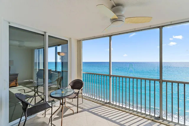 an aerial view of a house with outdoor space