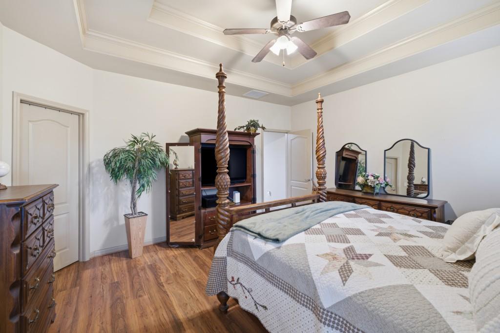 53 Bobbin Court Jefferson, GA 30549 - Photo 24 of 40 a bedroom with a bed and a flat screen tv