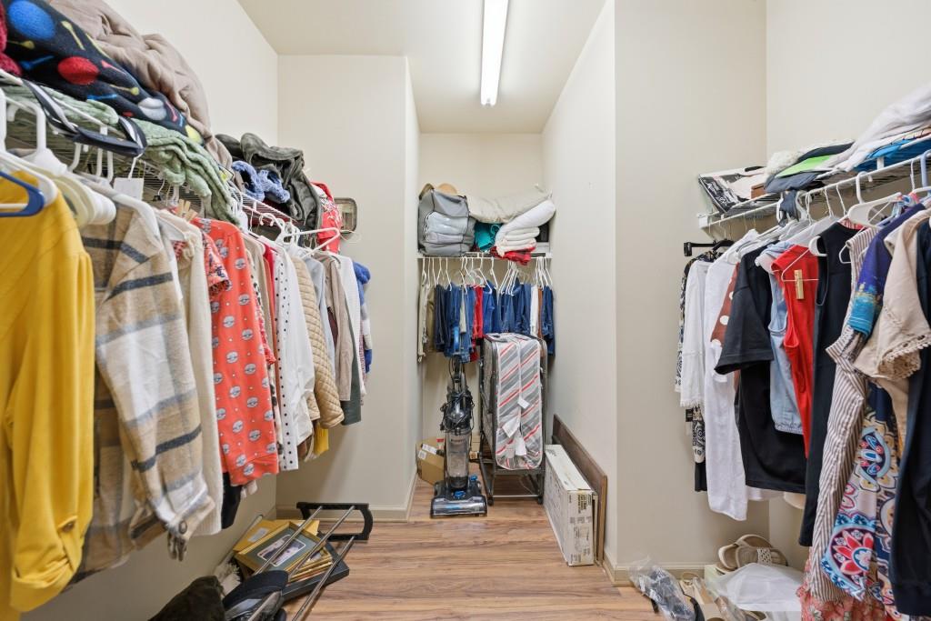 53 Bobbin Court Jefferson, GA 30549 - Photo 27 of 40 a view of walk in closet with clothes