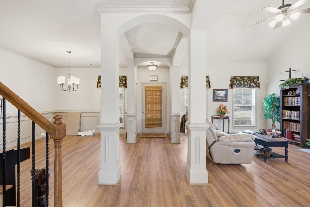 53 Bobbin Court Jefferson, GA 30549 - Photo 8 of 40 a living room with furniture and a wooden floor