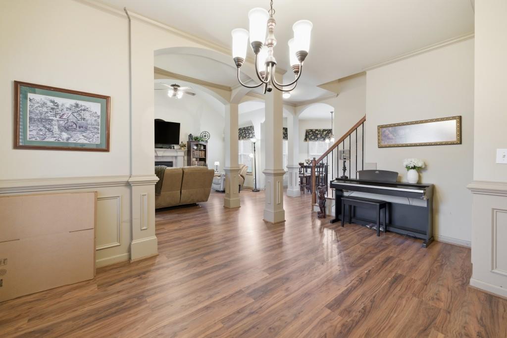 53 Bobbin Court Jefferson, GA 30549 - Photo 10 of 40 a living room with furniture and a wooden floor