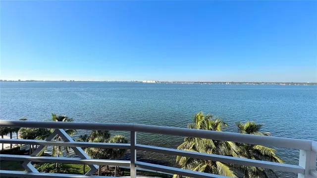a view of a lake from a balcony
