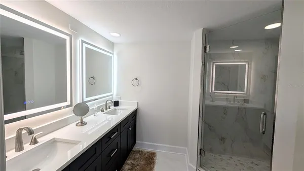 an outdoor view of water with outdoor seating