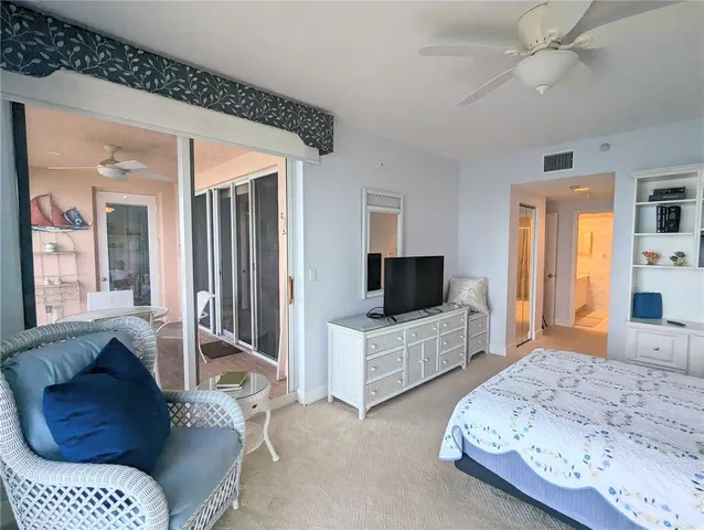 a view of a balcony with wooden floor