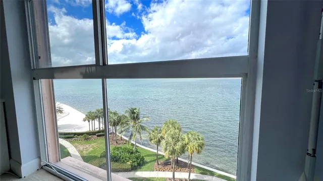 a white refrigerator freezer sitting in a kitchen