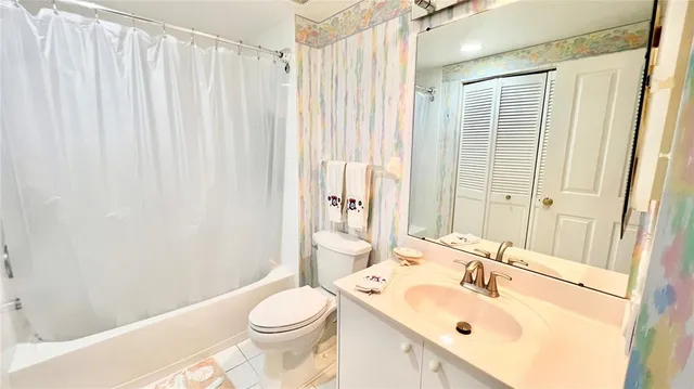 a view of a pathway with plants