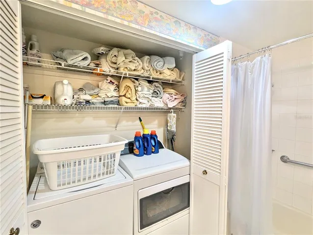 swimming pool view with a outdoor seating space