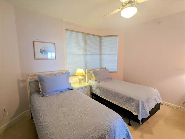 a view of a swimming pool with a yard