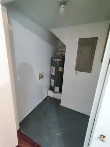 a view of a hallway with a window