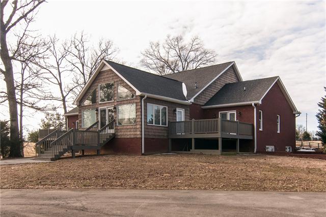 730 Williamson County Line Road Fairview, TN 37062 - Photo 20 of 20 a front view of a house with a yard and garage