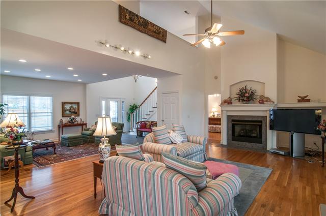 730 Williamson County Line Road Fairview, TN 37062 - Photo 4 of 20 a living room with furniture and a fireplace