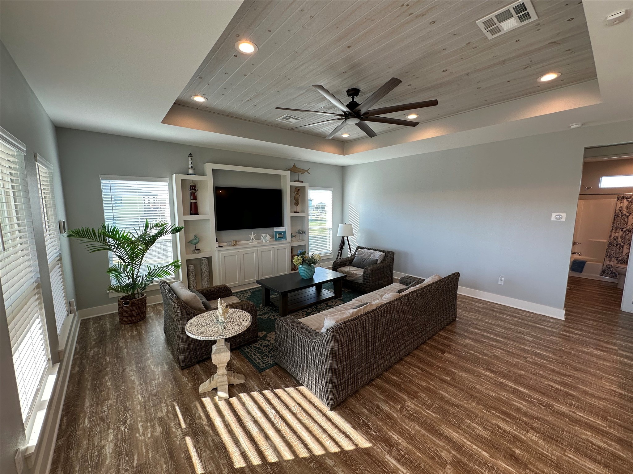2429 Sand Castle Crystal Beach, TX 77650 - Photo 15 of 46 a living room with furniture and a flat screen tv