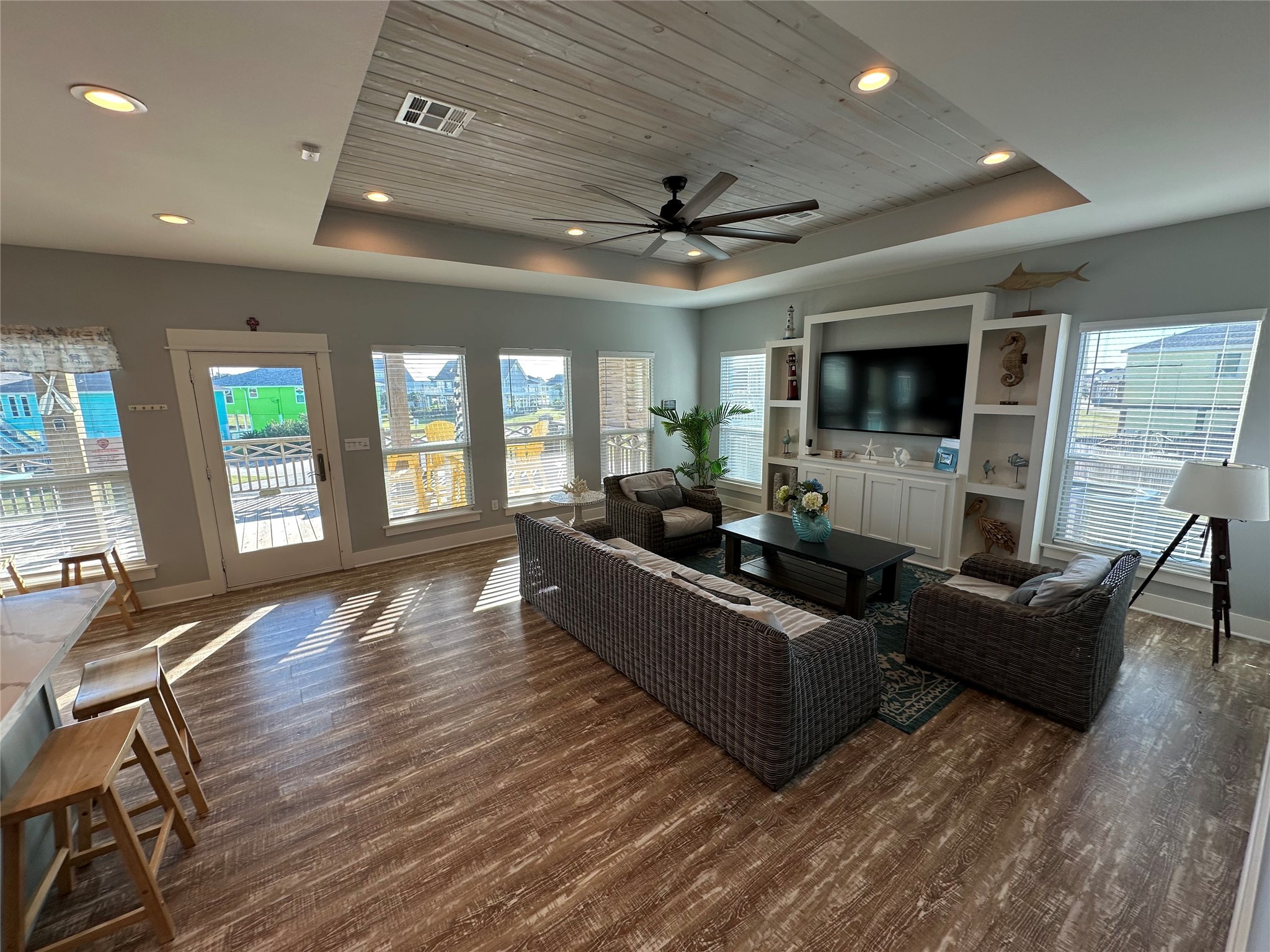 2429 Sand Castle Crystal Beach, TX 77650 - Photo 18 of 46 a living room with furniture wooden floor and a window