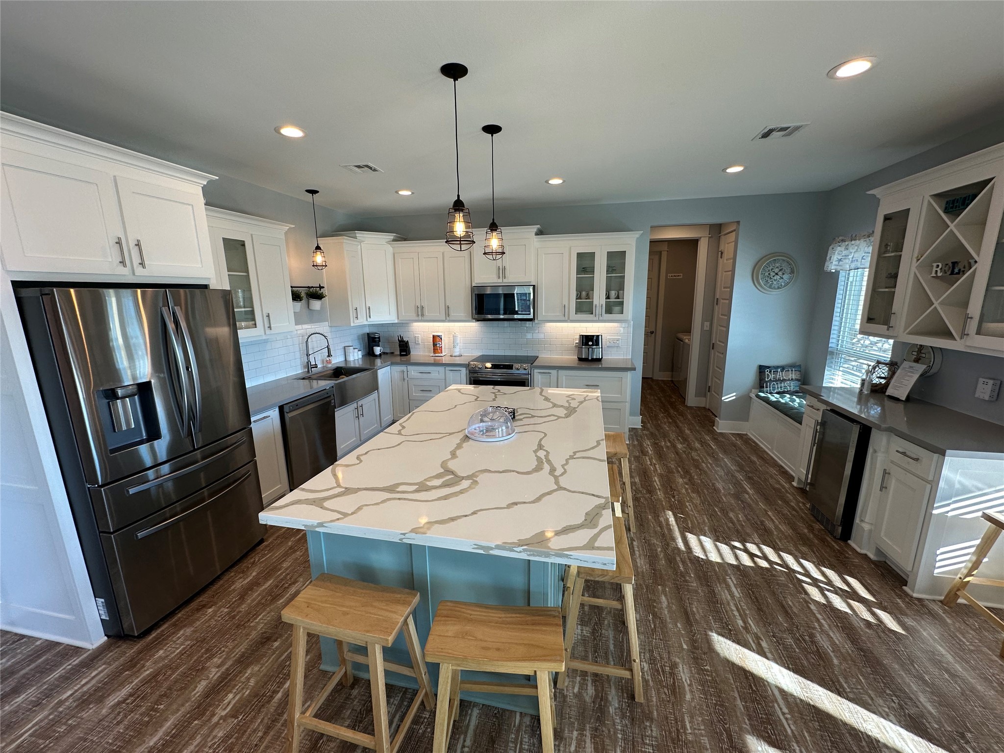 2429 Sand Castle Crystal Beach, TX 77650 - Photo 21 of 46 a large kitchen with a table and chairs