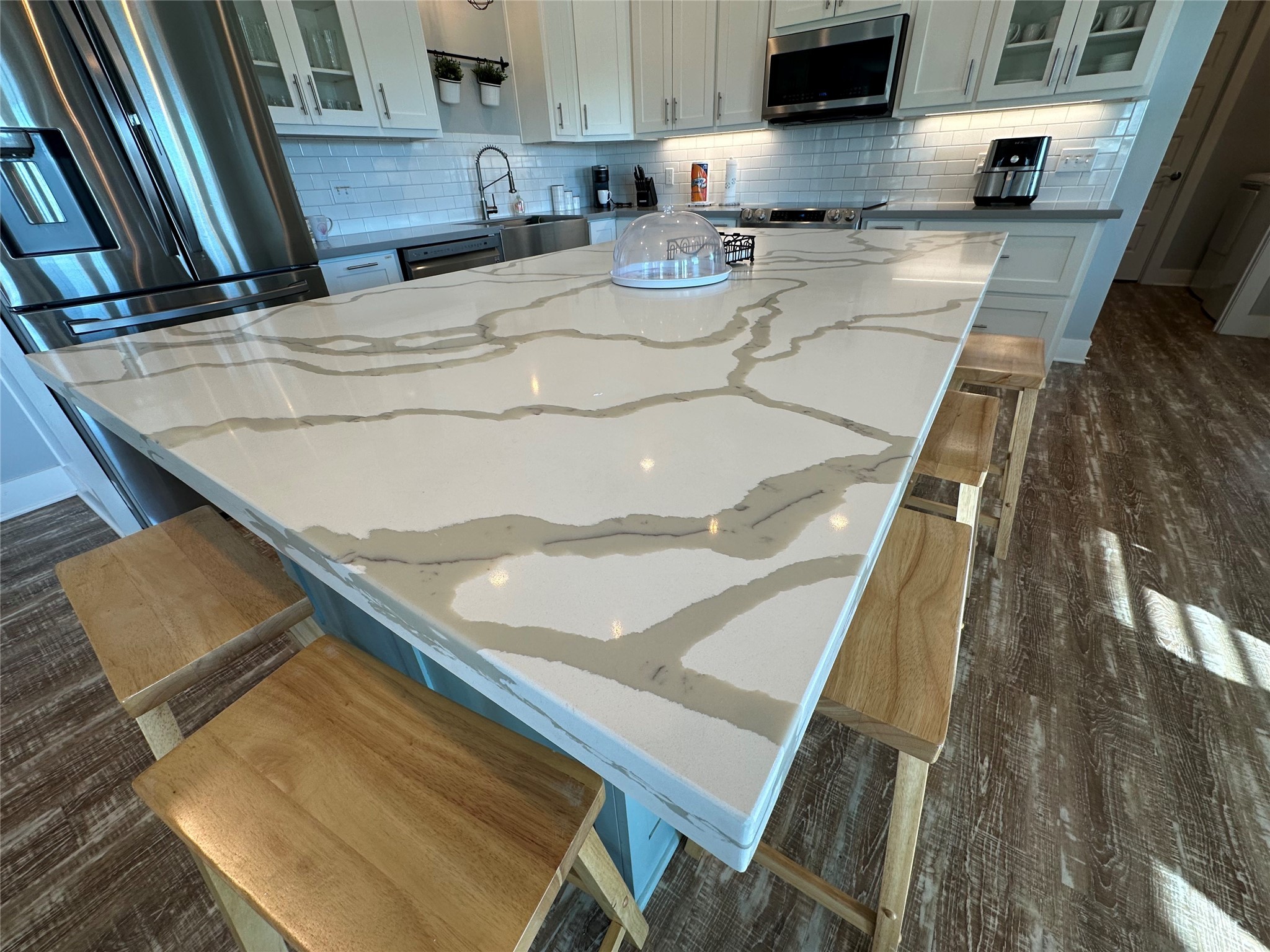 2429 Sand Castle Crystal Beach, TX 77650 - Photo 22 of 46 a kitchen with a sink a stove and cabinets